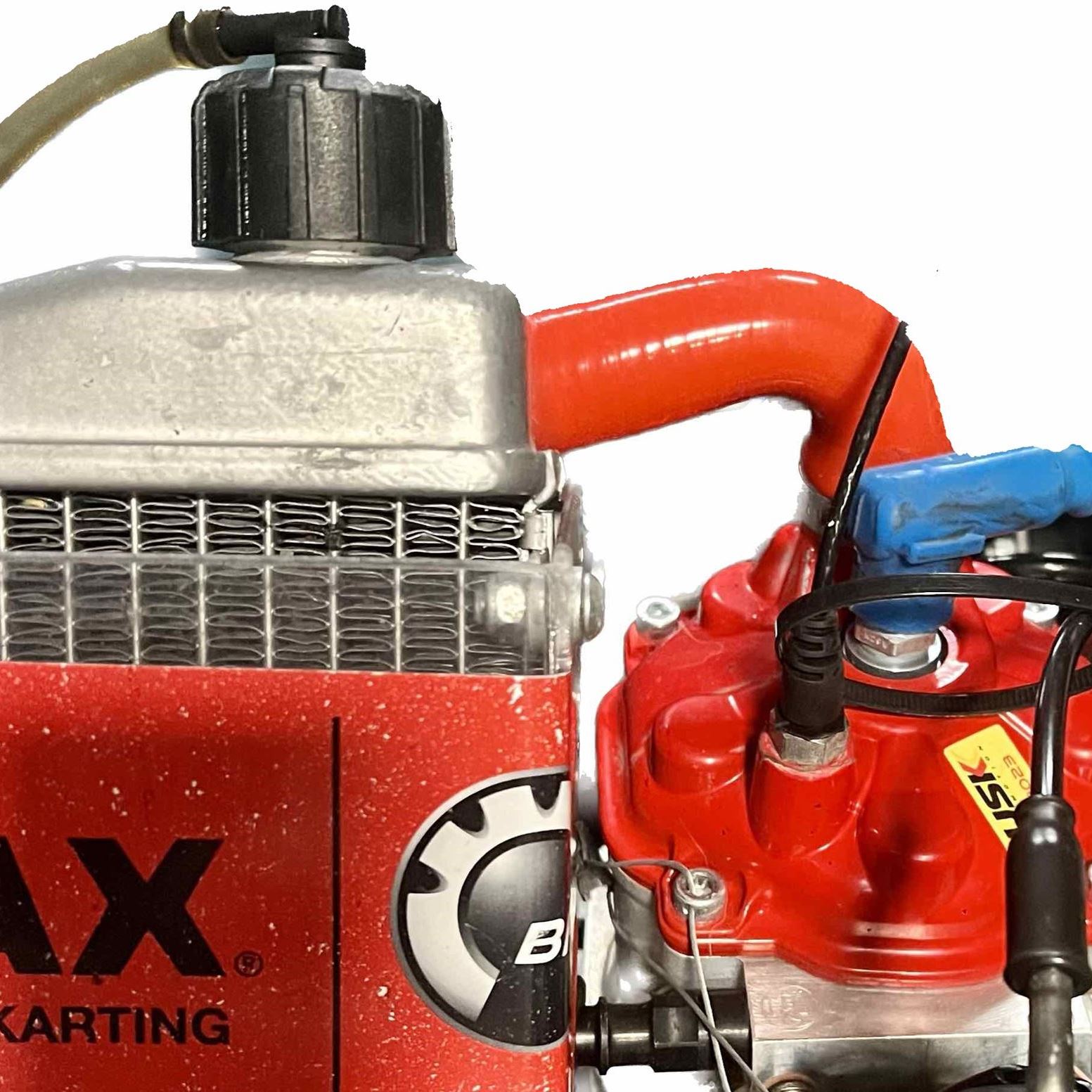 Патрубок радіатора Rotax червоний